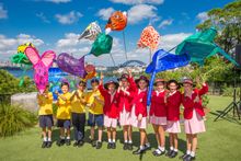 Students from Queenwood School for Girls in Mosman and Haberfield Public School in Haberfield  with their lanterns which will fe