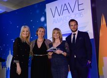 Sarah Wikevand, Head of Commercial at Reader Offers Ltd collecting the award