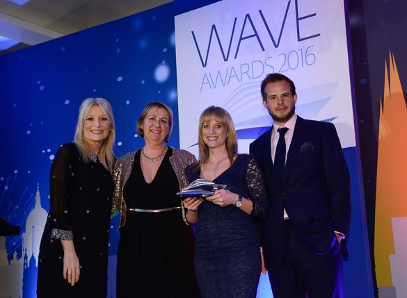 Sarah Wikevand, Head of Commercial at Reader Offers Ltd collecting the award