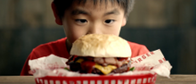 A child eyes off one of Brodburger's masterpieces in VisitCanberra's wonder-inspired Weekend Movie Trailer.