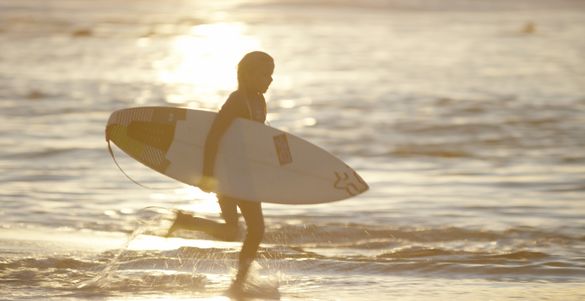 A young surfer takes to the waves at Snapper Rocks, part of the eighth World Surfing Reserve.