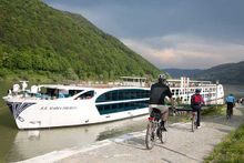 Guests cycling along the Danube River bike path.