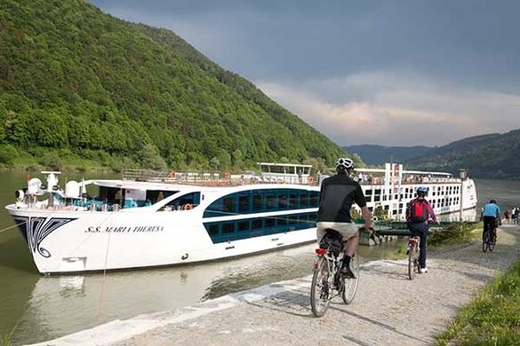 Guests cycling along the Danube River bike path. Guests cycling along the Danube River bike path.