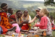 Karibu: Meeting locals on a Karibu luxury safari in Kenya - one of the adventure options available through the new Adventure Jun