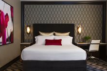 Image 2: A King Room at Hotel Allegro, Chicago. 