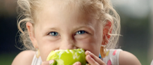 A child tucks into dessert during VisitCanberra's Wonder-inspired movie trailer.