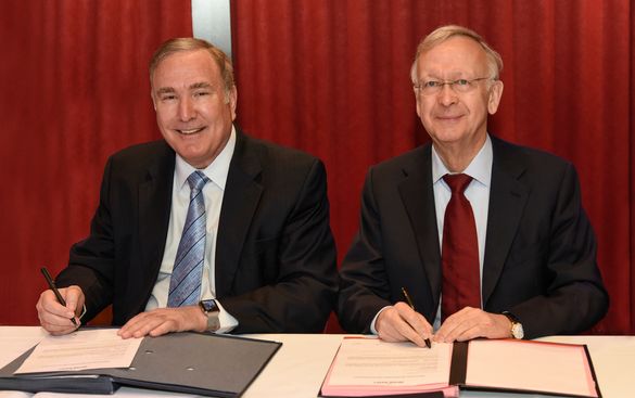 Royal Caribbean Cruises Ltd.’s Chairman and CEO Richard D. Fain, left, officially receives the new ship from Meyer Werft Yard’s 