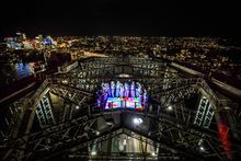 Climbers on The Vivid Climb 2016 dancing on a 70s style Disco Dance Floor at the top of the Sydney Harbour Bridge_Aerial shot