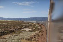 Miles-Rowland_Ghan-on-curve-and-landscape-during-day