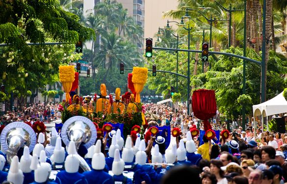 Aloha festivals parade going down Kalakaua Avenue 