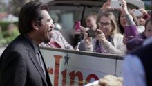 George Lopez greets a Starline Tours open-air van full of engaging tourists on his new television series, 