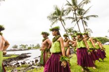 Hula halau walks to performance area.