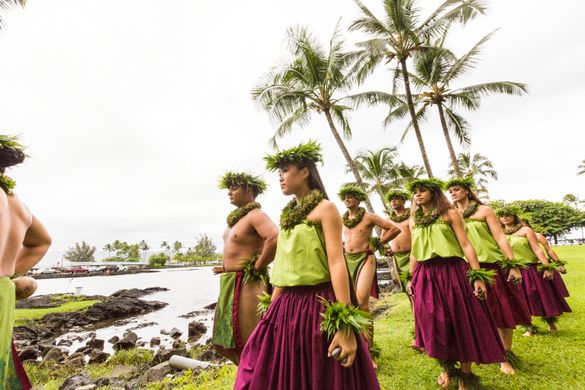 Hula halau walks to performance area.