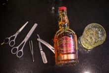 Indulge in sinfully good haircuts, traditional wet shaves and beard trims at QT Canberra's Barber Shop, all served with whisky n