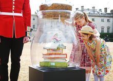 Two young visitors to the Horse Guards admire a selection of the Dream Jars