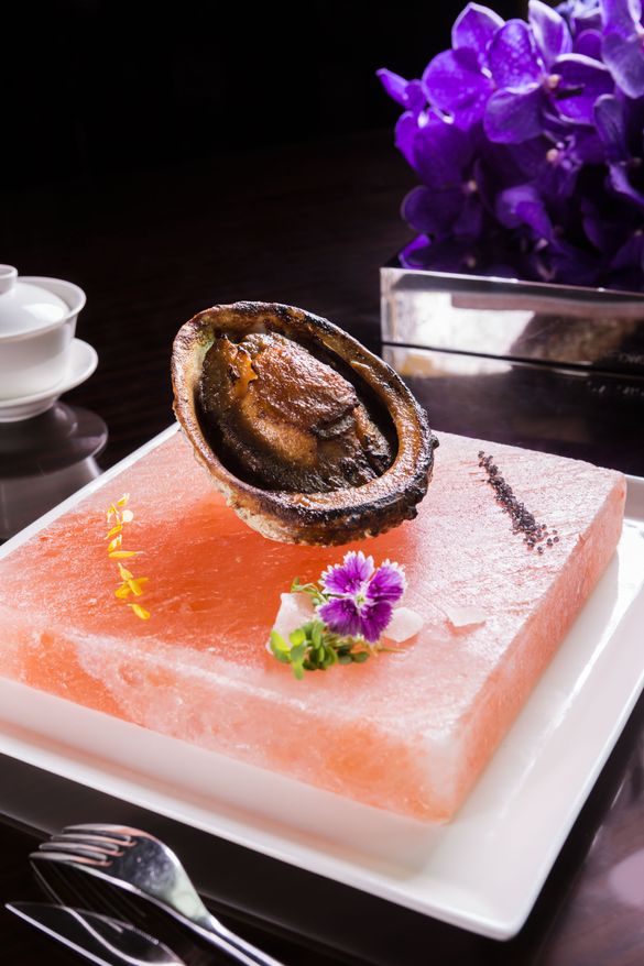Baked Australian abalone with Himalayan rock salt Baked Australian abalone with Himalayan rock salt