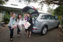 The team at Jupiters Gold Coast deliver items to the Currumbin Wildlife Hospital