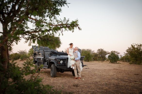 Wedding couple in game vehicle