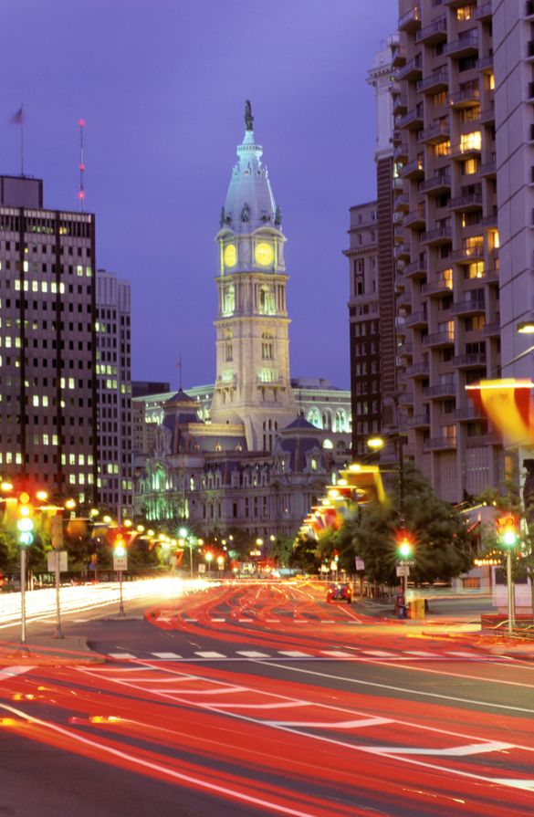 This nighttime view of Philadelphia's City Hall from the Benjamin Franklin Parkway shows the magnificence of the building. Compl