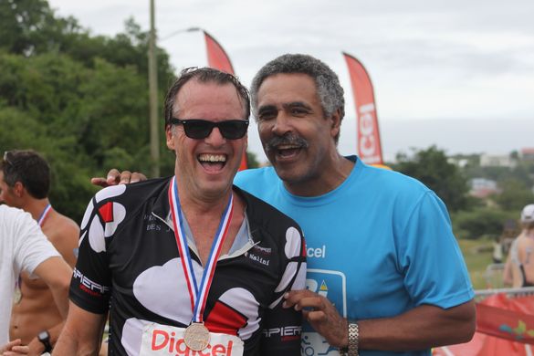 Former Olympian, Daley Thompson, with a Tri St Lucia competitor