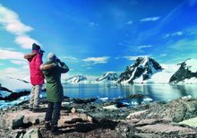 Two wildlife enthusiasts enjoying an Arctic expedition