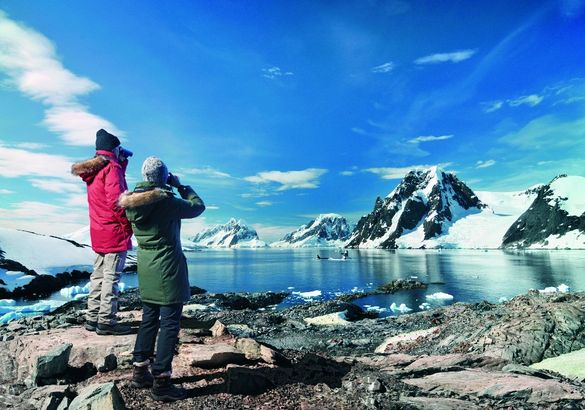 Two wildlife enthusiasts enjoying an Arctic expedition