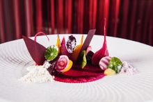 Heirloom beetroot salad with goats curd, orange and nasturtium 