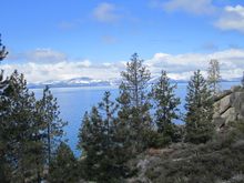 Lake Tahoe looms in the distance at Lake Tahoe-Nevada State Park 