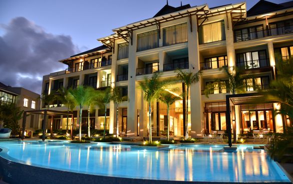 EXTERIOR OF EDEN BLEU HOTEL BY NIGHT