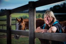 GOLDOC board member Glynis Nunn-Cearns is all smiles on her horse property at Mount Tambourine in the Gold Coast Hinterland.