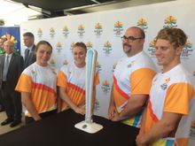 Australian athletes (from left) Kristina Clonan, Sally Pearson, Damon Kelly and Ryan Fisher proudly pose with the GC2018 Queen's Baton after it's unveiling on the Gold Coast.