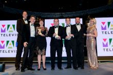 Directors of Coast & Country Cottages, Andrew and Karen Jones, at the 2016 British Travel Awards, joined by Martin Bayfield, award presenters Peter Darrant and Mel Crawford, and other award winners. 