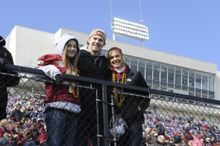 Fans cheer for their team at the Camping World Independence Bowl.