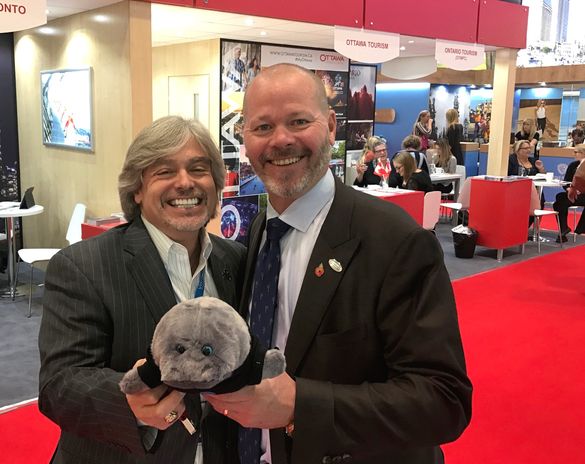 Visit Tampa Bay CEO Santiago Corrada (left) and VISIT FLORIDA CEO Will Seccombe join Mango the Manatee at WTM London in November.