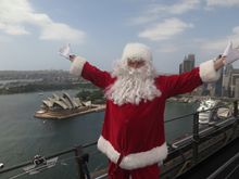 Santa drops in on BridgeClimb