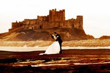 First kiss as Mr & Mrs at Bamburgh Castle
