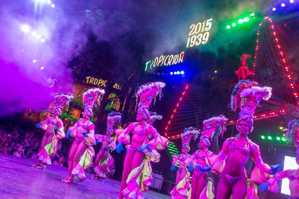 Guests enjoy a Tropicana show while touring with International Expeditions. 