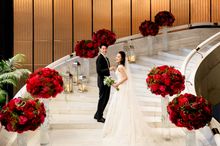 Bride & Groom on White Marble Staircase