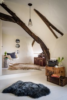 The master bedroom with king-size bed and en suite bathroom