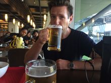 Robbo sipping a Singha