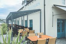 The outside terrace at The Havener's on the quayside in Fowey.