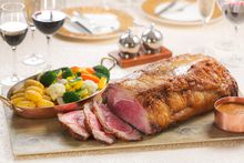 Roasted US rib eye of beef with shallot red wine sauce
