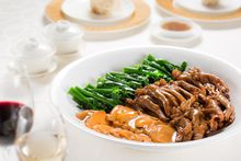 Braised abalone slices with goose feet and vegetables
