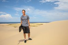 Tony Hawk sandboarding at Stockton Sand Dunes, Port Stephens