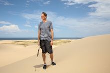 Tony Hawk sandboarding at Stockton Sand Dunes, Port Stephens