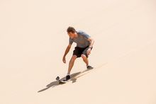 Tony Hawk sandboarding at Stockton Sand Dunes, Port Stephens