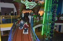 Zipping down the 47-foot chocolate slide