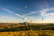 The Canberra Balloon Spectacular will see more than 40 balloons float across Canberra skies as the sun rises.
