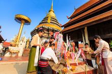 As part of the celebration, Buddhists visit temples to make merits and seek blessings.