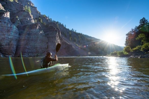First Descents founder Brad Ludden kayaking Clark Fork River in Montana